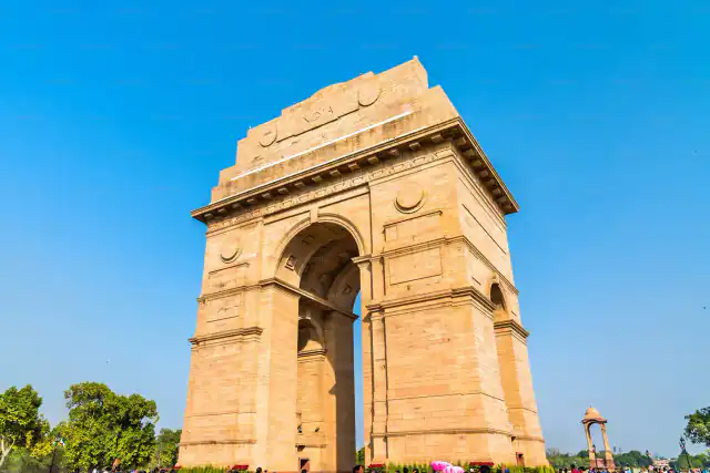 India Gate war memorial in New Delhi under a clear blue sky